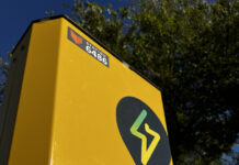 Tourists gather round EV Charging sites