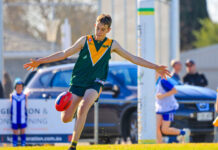 Junior footballers in action