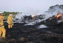 Tyre pile fire spreads to hay, farm machinery at Parawa