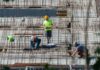 Construction workers help