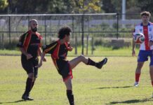 Strikers work hard against strong Cove side